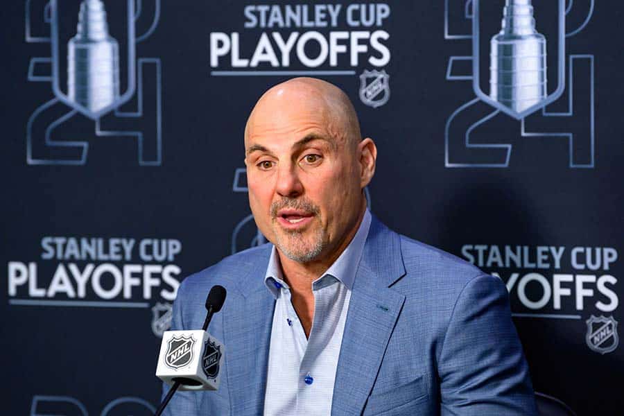 VANCOUVER, CANADA - MAY 20: Vancouver Canucks head coach Rick Tocchet speaks to the press after losing to the Edmonton Oilers in Game Seven of the Second Round of the 2024 Stanley Cup Playoffs at Rogers Arena on May 20, 2024 in Vancouver, British Columbia, Canada.
