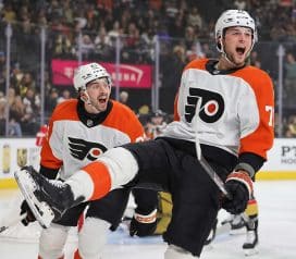 LAS VEGAS, NEVADA - JANUARY 02: Tyson Foerster (R) #71 of the Philadelphia Flyers celebrates with teammate Noah Cates #27 after Cates assisted Foerster on a first-period goal against the Vegas Golden Knights during their game at T-Mobile Arena on January 02, 2025 in Las Vegas, Nevada. The Golden Knights defeated the Flyers 5-2.