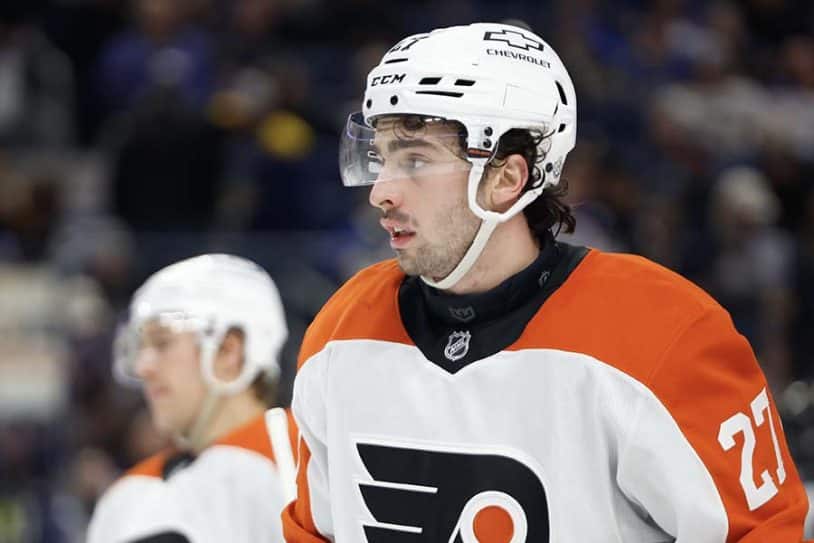 BUFFALO, NEW YORK - APRIL 17: Noah Cates #27 of the Philadelphia Flyers looks on against the Buffalo Sabres during the third period at KeyBank Center on April 17, 2025 in Buffalo, New York.