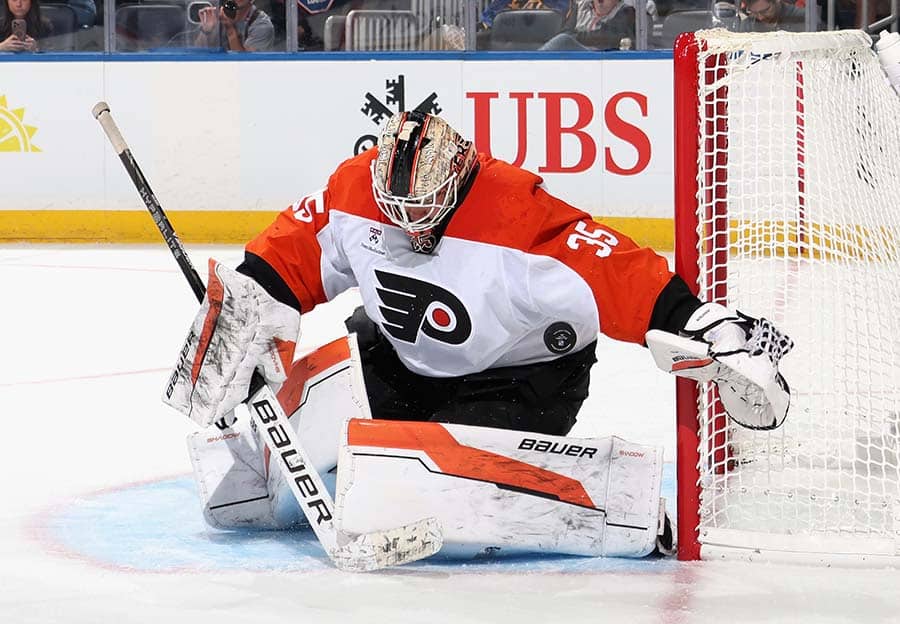 Aleksei Kolosov #35 of the Philadelphia Flyers makes a second period save against the New York Islanders in a preseason game at UBS Arena on September 21, 2025 in Elmont, New York.