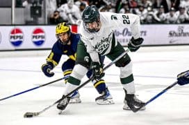Michigan State's Porter Martone moves the puck against Michigan during the third period on Friday, Dec. 5, 2025, at Munn Ice Arena in East Lansing.