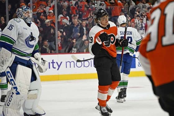 Dec 22, 2025; Philadelphia, Pennsylvania, USA; Philadelphia Flyers right wing Nikita Grebenkin (29) celebrates his goal against the Vancouver Canucks during the second period at Xfinity Mobile Arena.
