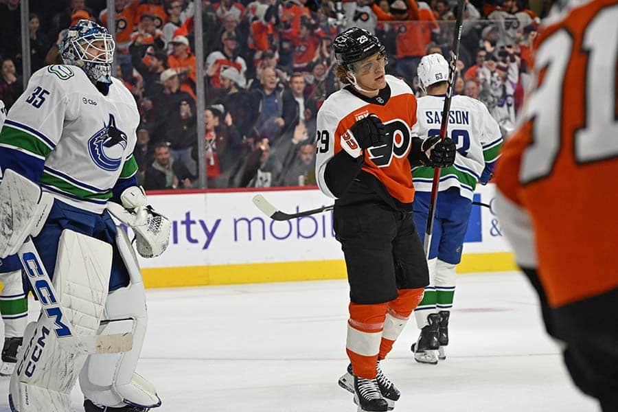 Dec 22, 2025; Philadelphia, Pennsylvania, USA; Philadelphia Flyers right wing Nikita Grebenkin (29) celebrates his goal against the Vancouver Canucks during the second period at Xfinity Mobile Arena.