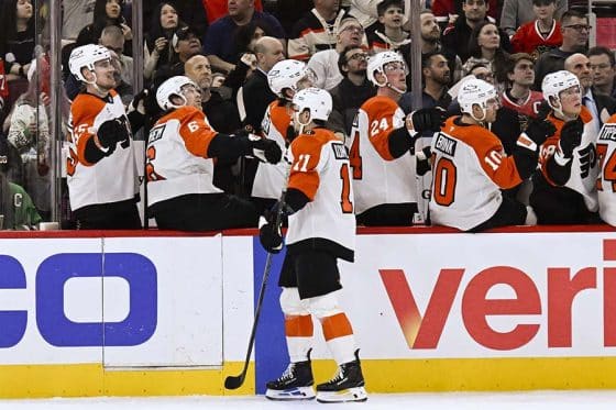 Dec 23, 2025; Chicago, Illinois, USA; Philadelphia Flyers right wing Travis Konecny (11) celebrates with teammates after scoring against the Chicago Blackhawks during the first period at United Center.