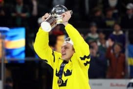 ST PAUL, MINNESOTA - JANUARY 05: Jack Berglund #26 of Sweden celebrates with the trophy after the Gold medal game against Czechia during the IIHF World Junior Hockey Championship at Grand Casino Arena on January 05, 2026 in St Paul, Minnesota. Sweden defeated Czechia 3-2.