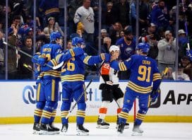 Jan 14, 2026; Buffalo, New York, USA; Buffalo Sabres defenseman Rasmus Dahlin (26) celebrates his goal with teammates during the first period against the Philadelphia Flyers at KeyBank Center.