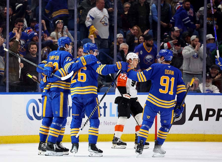 Jan 14, 2026; Buffalo, New York, USA; Buffalo Sabres defenseman Rasmus Dahlin (26) celebrates his goal with teammates during the first period against the Philadelphia Flyers at KeyBank Center.
