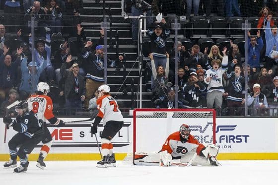 Jan 21, 2026; Salt Lake City, Utah, USA; Utah Mammoth right wing Clayton Keller (9) scores a goal against Philadelphia Flyers goaltender Samuel Ersson (33) to win the game in overtime at Delta Center.