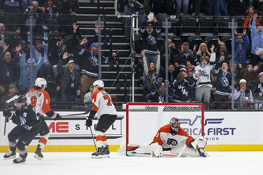 Jan 21, 2026; Salt Lake City, Utah, USA; Utah Mammoth right wing Clayton Keller (9) scores a goal against Philadelphia Flyers goaltender Samuel Ersson (33) to win the game in overtime at Delta Center.